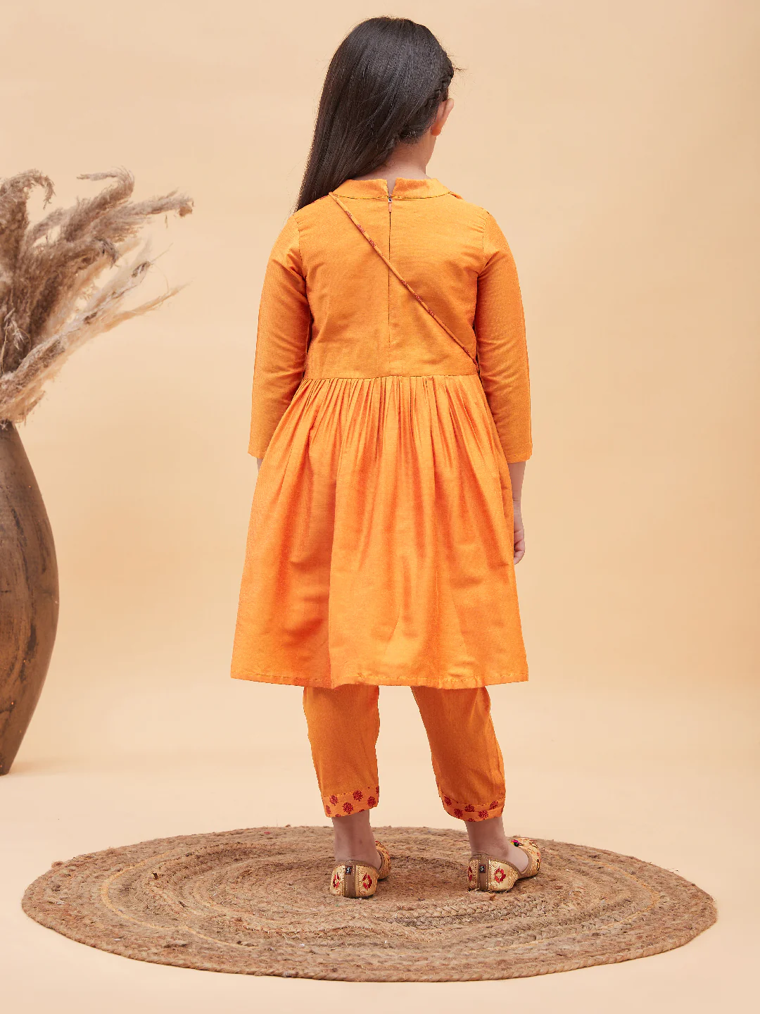 Girl's Orange Anarkali Kurta Pyjama Set With Potli Bag - Image 3