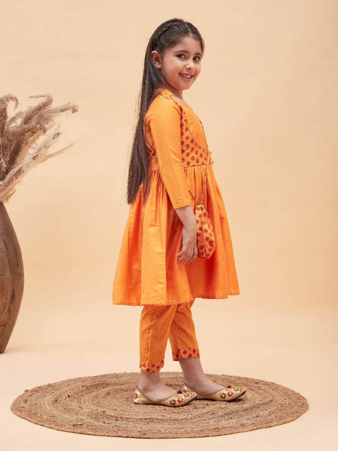 Girl's Orange Anarkali Kurta Pyjama Set With Potli Bag - Image 6